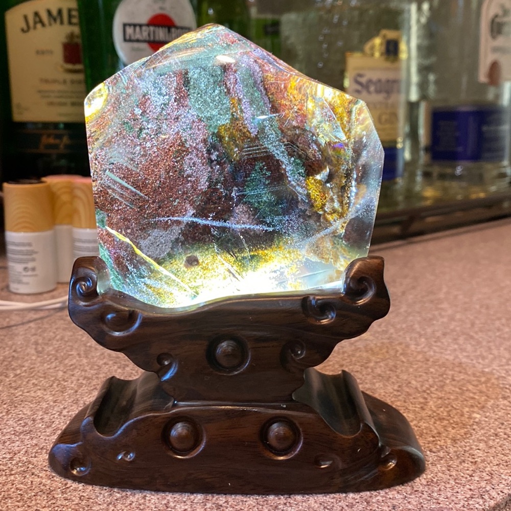 Gorgeous Brazilian, smoky 4 seasons garden quartz with lighted sandalwood stand
